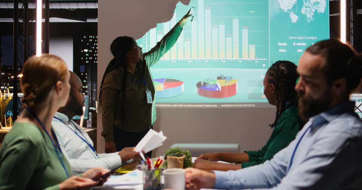 Analyst validating migrated analytics data against charts
